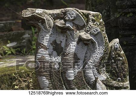 Stock Photograph - Naga bas-relief at the Vat Phou Temple Complex; Champasak, Laos. Fotosearch