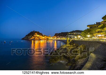 Night view from Tossa de Mar of Castell de Tossa, which was built in 1187; Tossa de Mar, Girona, Spain View Large Photo Image Stock Photograph - Night view from Tossa de Mar of Castell de Tossa, which was built in 1187; Tossa de Mar, Girona, Spain. Fotosearch