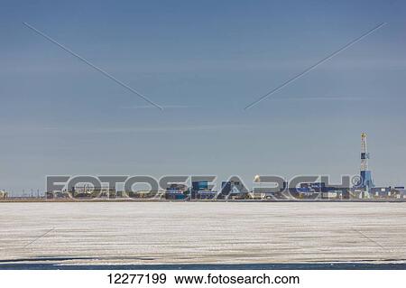 Oil and gas drill rig with surrounding infrastructure, Prudhoe Bay, Arctic Alaska, USA, Summer View Large Photo Image Stock Photo - Oil and gas drill rig with surrounding infrastructure, Prudhoe Bay, Arctic Alaska, USA, Summer . Fotosearch