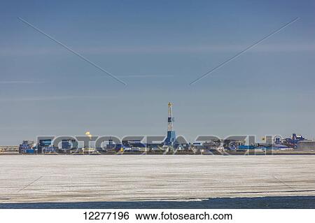 Oil and gas drill rig with surrounding infrastructure, Prudhoe Bay, Arctic Alaska, USA, Summer View Large Photo Image Stock Photograph - Oil and gas drill rig with surrounding infrastructure, Prudhoe Bay, Arctic Alaska, USA, Summer . Fotosearch