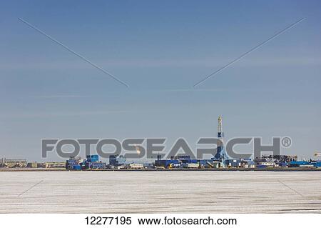 Oil and gas drill rig with surrounding infrastructure, Prudhoe Bay, Arctic Alaska, USA, Summer View Large Photo Image Stock Photography - Oil and gas drill rig with surrounding infrastructure, Prudhoe Bay, Arctic Alaska, USA, Summer . Fotosearch