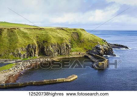Old harbour along the coast; Dunbeath, Scotland View Large Photo Image Stock Photograph - Old harbour along the coast; Dunbeath, Scotland. Fotosearch