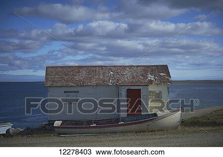 Old house and wooden boat by the Arctic Ocean; Cambridge Bay, Nunavut, Canada View Large Photo Image Stock Image - Old house and wooden boat by the Arctic Ocean; Cambridge Bay, Nunavut, Canada. Fotosearch