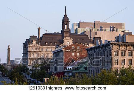 Stock Photograph - Old Montreal and city hall; Montreal, Quebec, Canada. Fotosearch