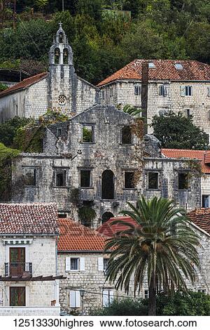Stock Photograph - Old stone buildings in Perast off the Bay of Kotor; Perast, Kotor Municipality, Monte. Fotosearch