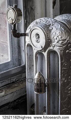 Original cast iron radiator in historical building; Winnipeg, Manitoba, Canada View Large Photo Image Stock Photograph - Original cast iron radiator in historical building; Winnipeg, Manitoba, Canada. Fotosearch