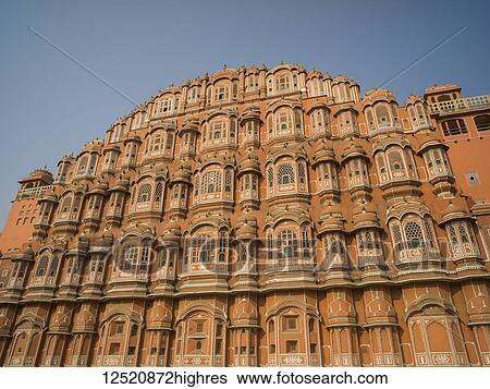 Stock Photograph - Palace of the Winds, named because it was essentially a high screen wall built so that the women of the royal family could observe street festivals while unseen from the outside; Jaipur, Rajasthan, India. Fotosearch