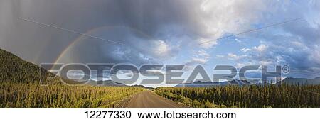 Panorama of a double rainbow and rainclouds over a dirt section of the Alaska Highway near Kluane Lake, Yukon Territory, Canada View Large Photo Image Stock Image - Panorama of a double rainbow and rainclouds over a dirt section of the Alaska Highway near Kluane Lake, Yukon Territory, Canada. Fotosearch
