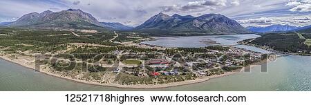 Panoramic aerial view of the town of Carcross; Carcross, Yukon Territory, Canada View Large Photo Image Stock Photograph - Panoramic aerial view of the town of Carcross; Carcross, Yukon Territory, Canada. Fotosearch