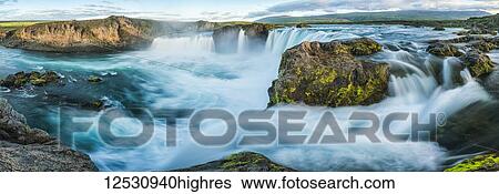 Stock Photograph - Panoramic image of Godafoss waterfall; Iceland. Fotosearch