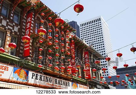 Paper lanterns decorate the exterior of the Peking Bazaar in San Francisco's China Town; San Francisco, California, United States of America View Large Photo Image Stock Image - Paper lanterns decorate the exterior of the Peking Bazaar in San Francisco's China Town; San Francisco, California, United States of America. Fotosearch