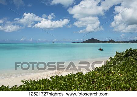 Personal watercraft at Jolly Harbour beach; Antigua and Barbuda View Large Photo Image Stock Photograph - Personal watercraft at Jolly Harbour beach; Antigua and Barbuda. Fotosearch