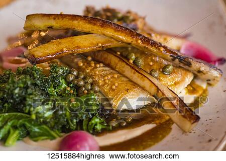 Plate of halibut with parsnips and kale, Hotel Husafell; Iceland View Large Photo Image Stock Photograph - Plate of halibut with parsnips and kale, Hotel Husafell; Iceland. Fotosearch