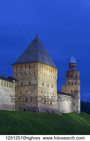 Stock Photograph - Pokrovskaya Tower (left), built in the 16th century, Kokouy Tower (right), built in the 17th century, Kremlin Wall; Veliky Novgorod, Novgorod Oblast, Russia. Fotosearch