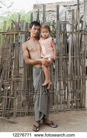 Portrait of a father and a daughter; Bagan, Myanmar View Large Photo Image Stock Image - Portrait of a father and a daughter; Bagan, Myanmar. Fotosearch