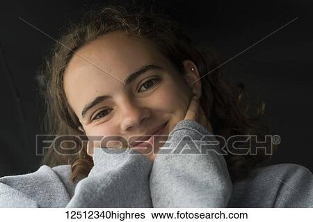 Stock Photograph - Portrait of a teenage girl; Lake of the Woods, Ontario, Canada. Fotosearch
