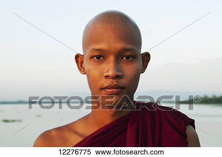 Portrait of a young buddhist monk; Mandalay, Myanmar View Large Photo Image Stock Photography - Portrait of a young buddhist monk; Mandalay, Myanmar. Fotosearch