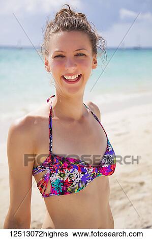 Portrait of a young caucasian woman in a bikini top on a tropical beach; Negril, Jamaica View Large Photo Image Stock Photograph - Portrait of a young caucasian woman in a bikini top on a tropical beach; Negril, Jamaica. Fotosearch