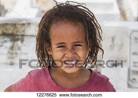 Portrait of a young girl; Dili, East Timor View Large Photo Image Stock Photography - Portrait of a young girl; Dili, East Timor. Fotosearch