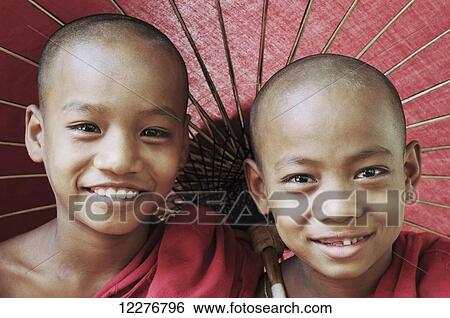 Portrait of two novice buddhist monks; Myanmar View Large Photo Image Stock Photograph - Portrait of two novice buddhist monks; Myanmar. Fotosearch