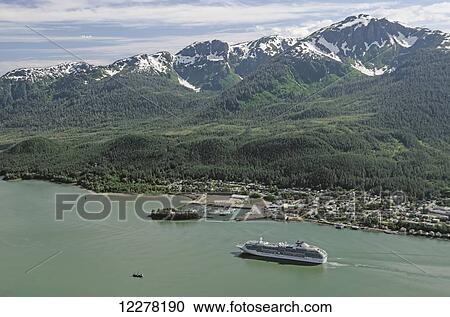 Princess Cruises' Coral Princess in Gastineau Channel with Douglas and Douglas Island visible in the background, Southeast Alaska View Large Photo Image Stock Image - Princess Cruises' Coral Princess in Gastineau Channel with Douglas and Douglas Island visible in the background, Southeast Alaska. Fotosearch