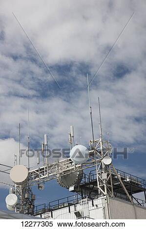 Stock Photography - Radio antennas and receivers atop a building, Whitehorse, Yukon Territory, Canada, Summer. Fotosearch