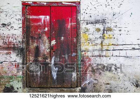 Red wooden doors and wall splattered with multiple paint colours; Nicaragua View Large Photo Image Stock Photograph - Red wooden doors and wall splattered with multiple paint colours; Nicaragua. Fotosearch