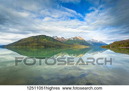 Stock Photograph - Reflections of Kenai Mountains in Kenai Lake; Alaska, United States of America. Fotosearch