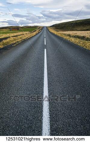 Stock Photograph - Road leading into the distance; Iceland. Fotosearch