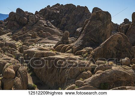Rock formations in the Alabama Hills with blue sky; California, United States of America View Large Photo Image Stock Photograph - Rock formations in the Alabama Hills with blue sky; California, United States of America. Fotosearch