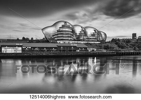 Stock Photograph - Sage Gateshead concert hall reflections in the River Tyne; Gateshead, Tyne and Wear, England. Fotosearch