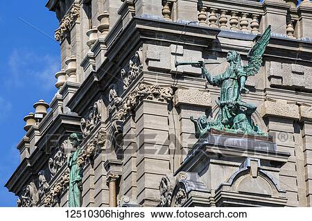 Stock Photograph - Saint-Enfant-Jesus Church with statues of angels; Montreal, Quebec, Canada. Fotosearch
