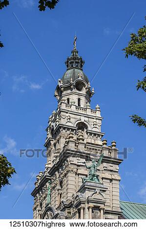 Stock Photograph - Saint-Enfant-Jesus Church with statues of angels; Montreal, Quebec, Canada. Fotosearch
