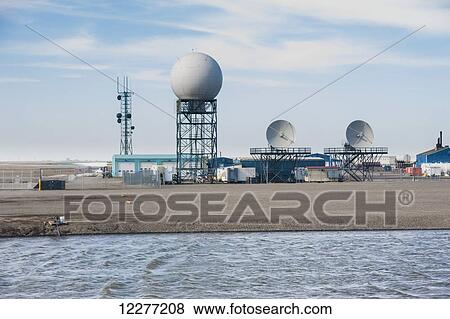 Stock Photo - Satellite dishes and a radar dome at a communications station, Prudhoe Bay, Arctic Alaska, USA, Summer. Fotosearch