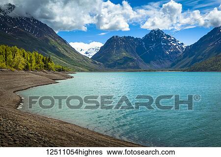 Stock Photograph - Scenic view of Eklutna Lake, Chugach State Park in summertime, South-central Alaska; Alaska, United States of America. Fotosearch