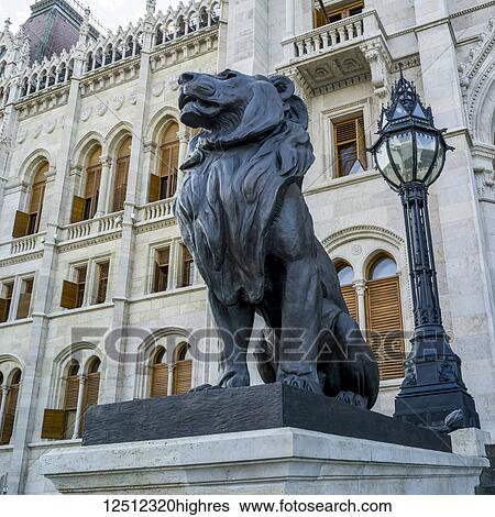Sculpture of a lion and lamp post outside the Hungarian Parliament Building, Budapest, Hungary; Budapest, Budapest, Hungary View Large Photo Image Stock Photograph - Sculpture of a lion and lamp post outside the Hungarian Parliament Building, Budapest, Hungary; Budapest, Budapest, Hungary. Fotosearch