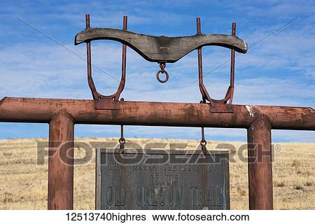Sign for the old Oregon trail, an interpretive sign is found along a highway in Gilliam County; Arlington, Oregon, United States of America View Large Photo Image Stock Photograph - Sign for the old Oregon trail, an interpretive sign is found along a highway in Gilliam County; Arlington, Oregon, United States of America. Fotosearch
