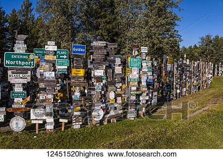 Signpost forest, an abundance and variety of signs on display; Watson Lake, Yukon, Canada View Large Photo Image Stock Photograph - Signpost forest, an abundance and variety of signs on display; Watson Lake, Yukon, Canada. Fotosearch