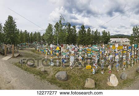 Signpost forest, Watson Lake, Yukon Territory, Canada, Summer View Large Photo Image Stock Photo - Signpost forest, Watson Lake, Yukon Territory, Canada, Summer. Fotosearch