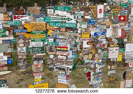 Signpost forest, Watson Lake, Yukon Territory, Canada, Summer View Large Photo Image Stock Photograph - Signpost forest, Watson Lake, Yukon Territory, Canada, Summer. Fotosearch
