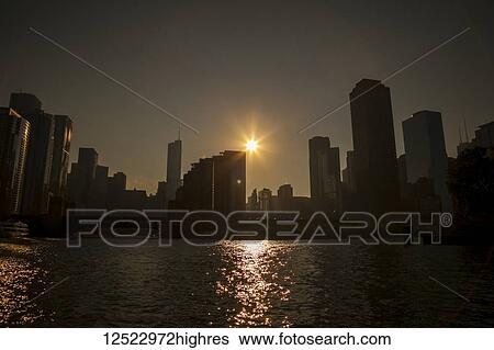 Sillhouette of Chicago skyline from Lake Michigan; Chicago, Illinois, United States of America View Large Photo Image Stock Photograph - Sillhouette of Chicago skyline from Lake Michigan; Chicago, Illinois, United States of America. Fotosearch