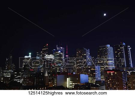 Stock Photograph - Skyline of Toronto at night; Toronto, Ontario, Canada. Fotosearch