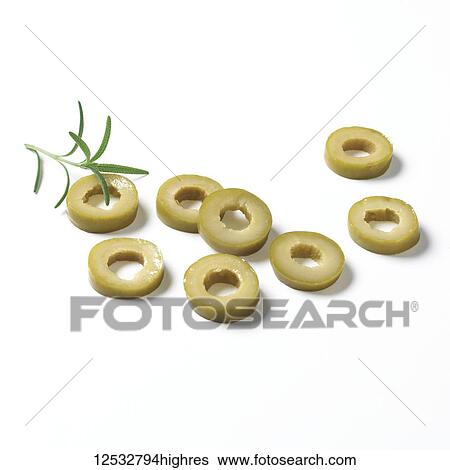 Stock Photograph - Sliced green olives on a white background. Fotosearch
