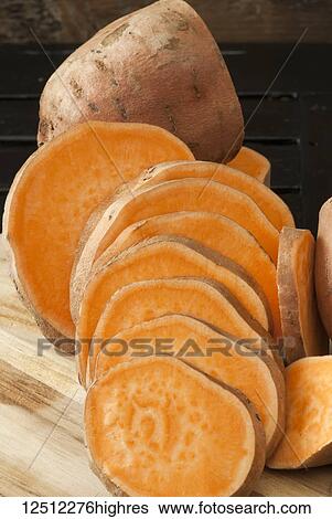 Sliced raw sweet potato View Large Photo Image Stock Photograph - Sliced raw sweet potato. Fotosearch