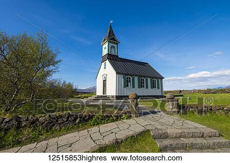 Stock Photograph - Small church in the countryside; Thingvellir, Iceland. Fotosearch