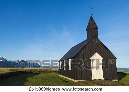 Stock Photograph - Small church on the Snaefellsnes peninsula; Budir, Iceland. Fotosearch