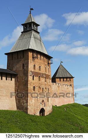 Spasskaya Tower (left), Dvortsovaya Tower (right), both 15th century, Kremlin Wall; Veliky Novgorod, Novgorod Oblast, Russia View Large Photo Image Stock Photograph - Spasskaya Tower (left), Dvortsovaya Tower (right), both 15th century, Kremlin Wall; Veliky Novgorod, Novgorod Oblast, Russia. Fotosearch