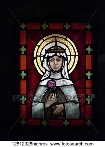 Stock Photograph - Stained glass window of a religious figure in St. Stephen's Basilica; Budapest, Budapest, Hungary. Fotosearch