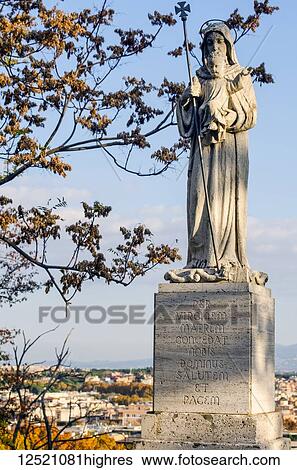 Statue of Virgin Mary and child with city in background; Monteverde Vecchio, Rome, Italy View Large Photo Image Stock Photograph - Statue of Virgin Mary and child with city in background; Monteverde Vecchio, Rome, Italy. Fotosearch