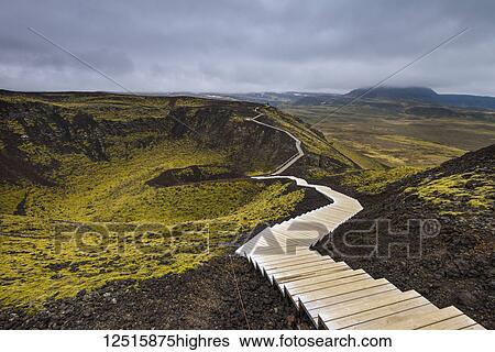 Stock Photograph - Steps going around the Grabrok crater; Iceland. Fotosearch